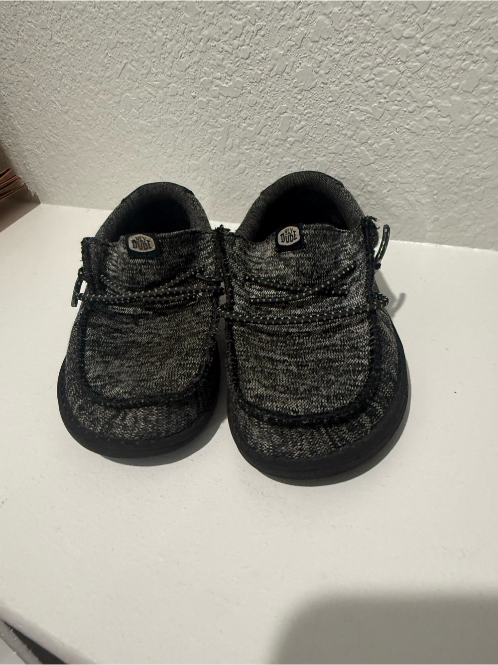 Hey Dude Kids Wally Knit Slip-On Sneakers in Black and Gray